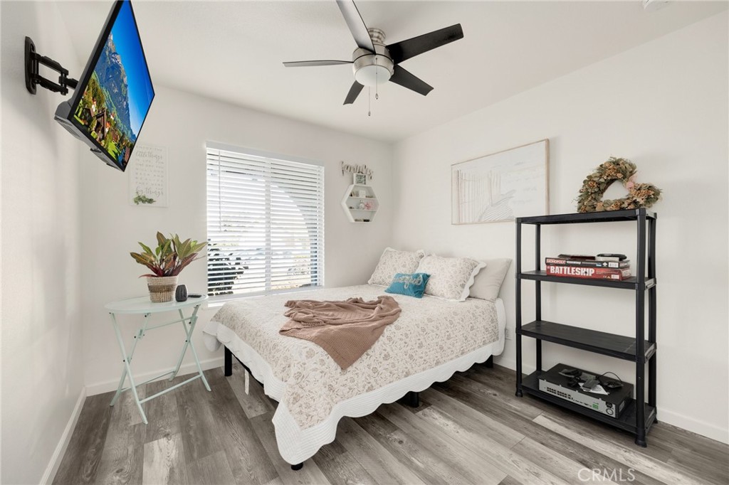 358 Lotus Place Brea, CA 92821 - Photo 20 of 31 a bedroom with a bed table and a window