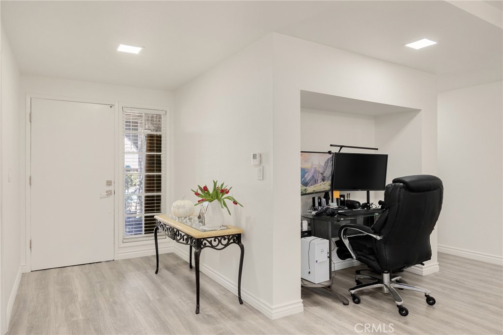 358 Lotus Place Brea, CA 92821 - Photo 2 of 31 a view of a workspace with furniture and a window