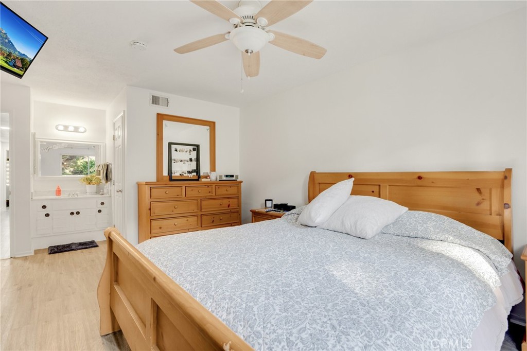 358 Lotus Place Brea, CA 92821 - Photo 22 of 31 a bedroom with a bed and a dresser