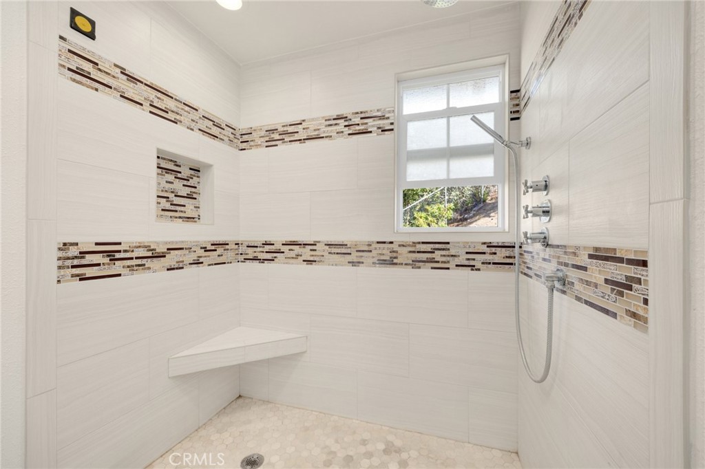 358 Lotus Place Brea, CA 92821 - Photo 25 of 31 a bathroom with a window and a shower