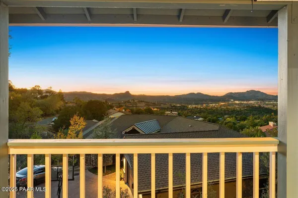 a kitchen with a refrigerator a sink and a cabinets