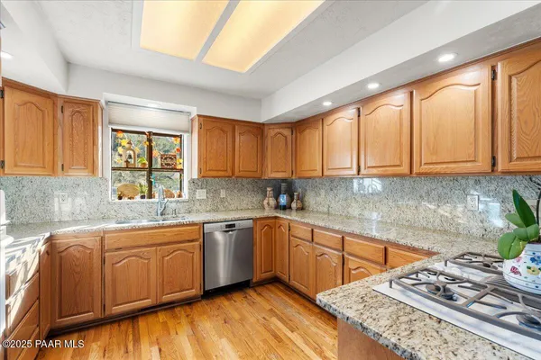 a living room with furniture fireplace and window