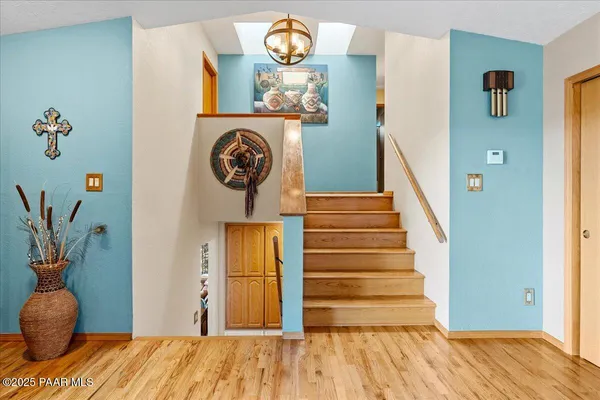 a view of a balcony with furniture