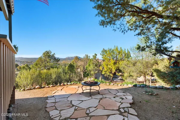 a view of a city with mountains in the background