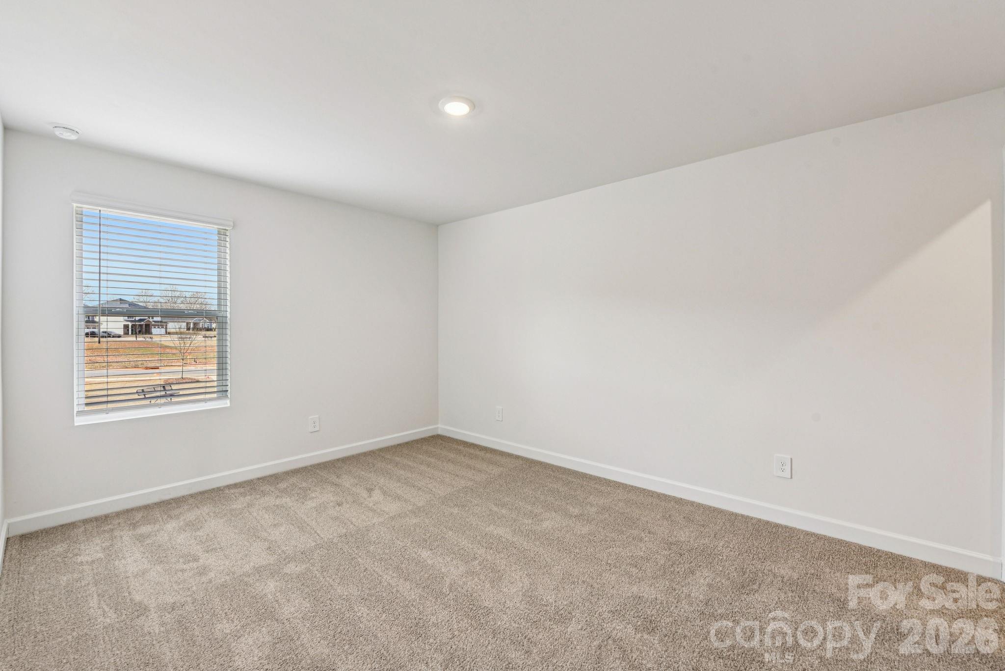 708 Palmer Pendleton Way York, SC 29745 - Photo 17 of 26 an empty room with a window