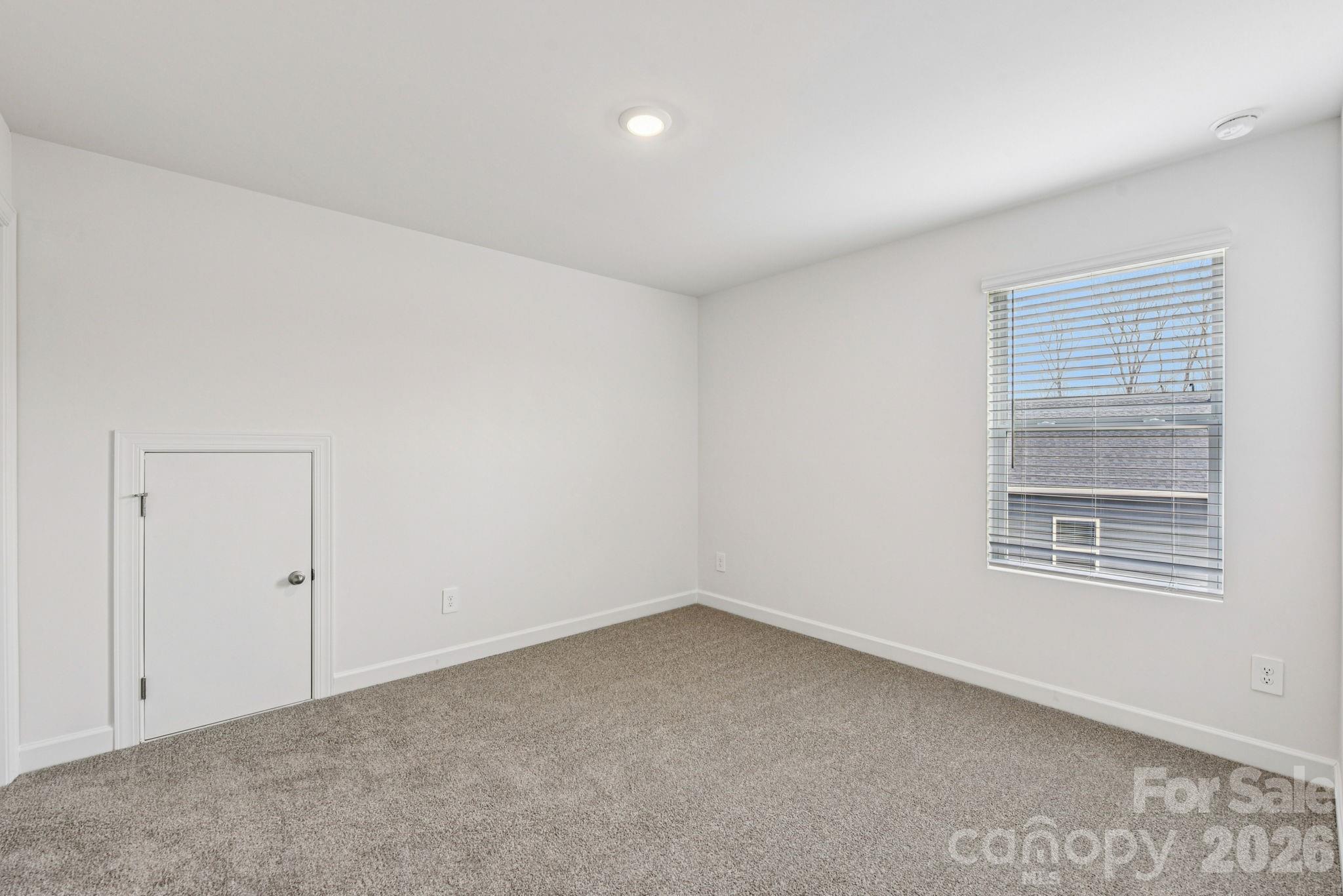 708 Palmer Pendleton Way York, SC 29745 - Photo 21 of 26 an empty room with a window