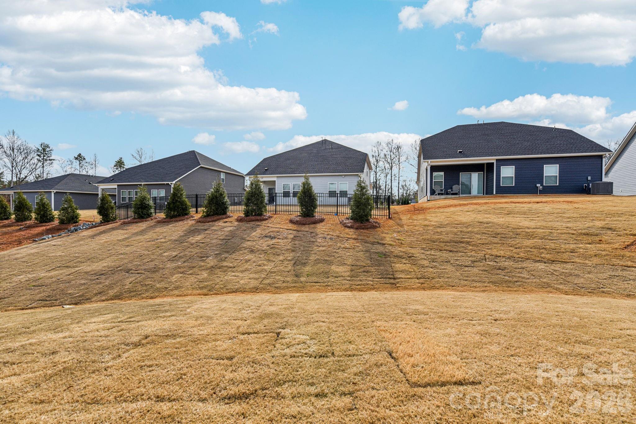 708 Palmer Pendleton Way York, SC 29745 - Photo 24 of 26 a front view of a house with a yard