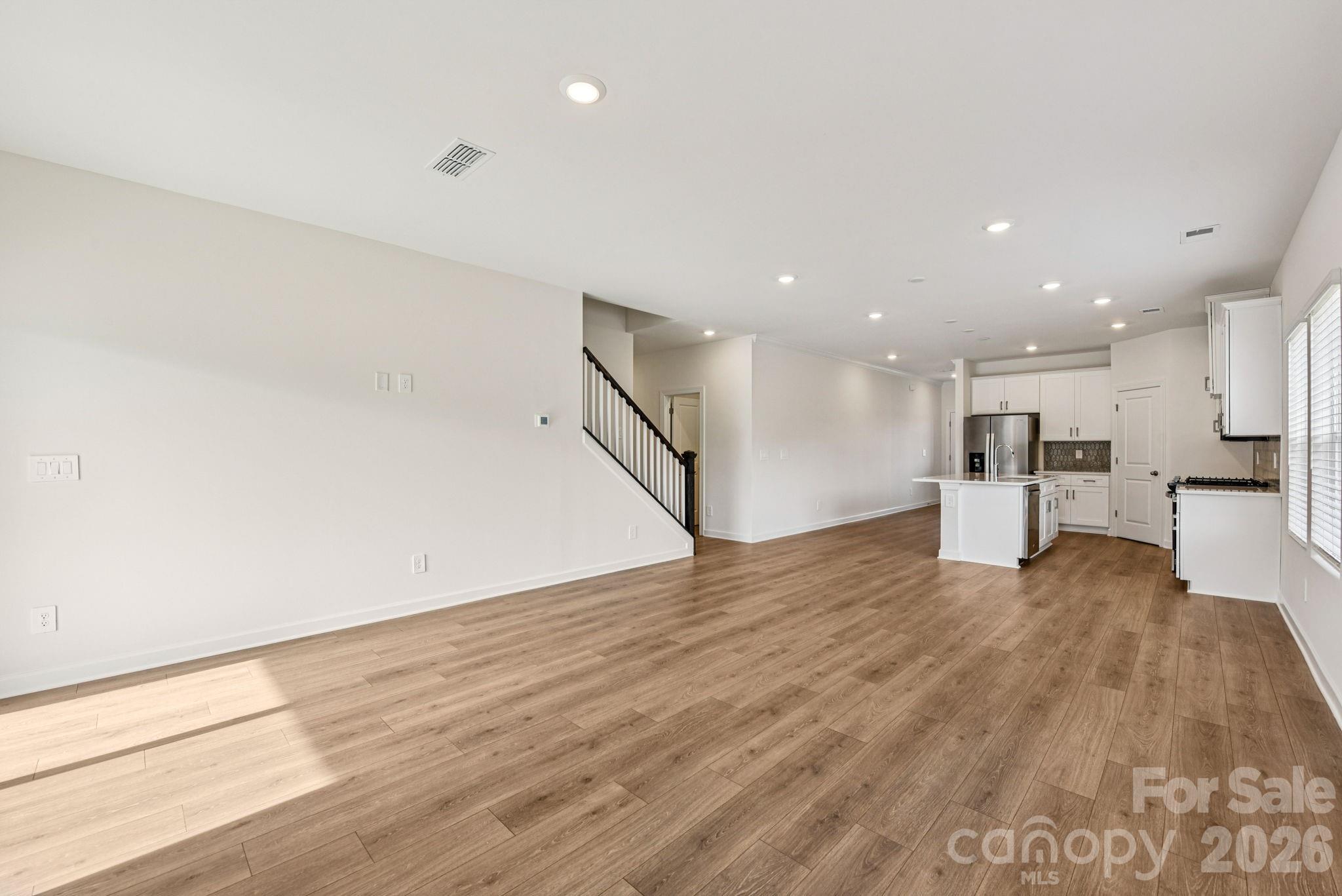 708 Palmer Pendleton Way York, SC 29745 - Photo 4 of 26 a view of empty room with wooden floor