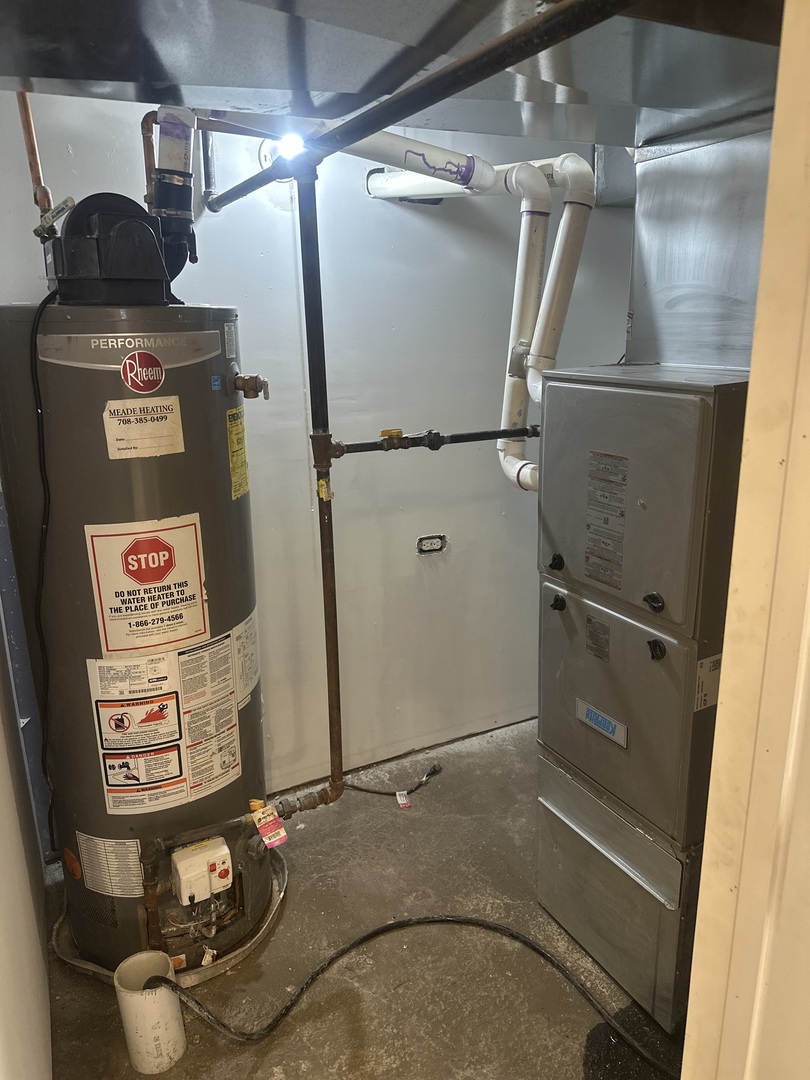 6715 South Sangamon Street Chicago, IL 60621 - Photo 31 of 43 a close view of water heater room