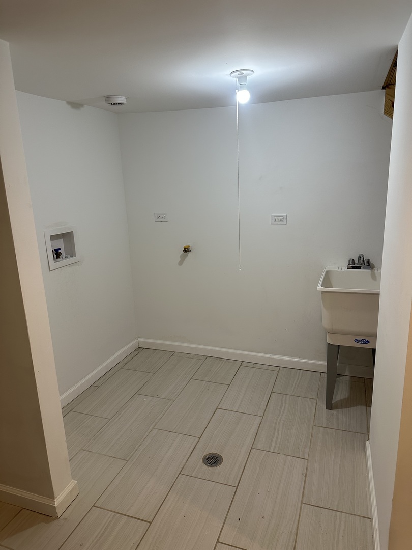 6715 South Sangamon Street Chicago, IL 60621 - Photo 32 of 43 a view of an empty room