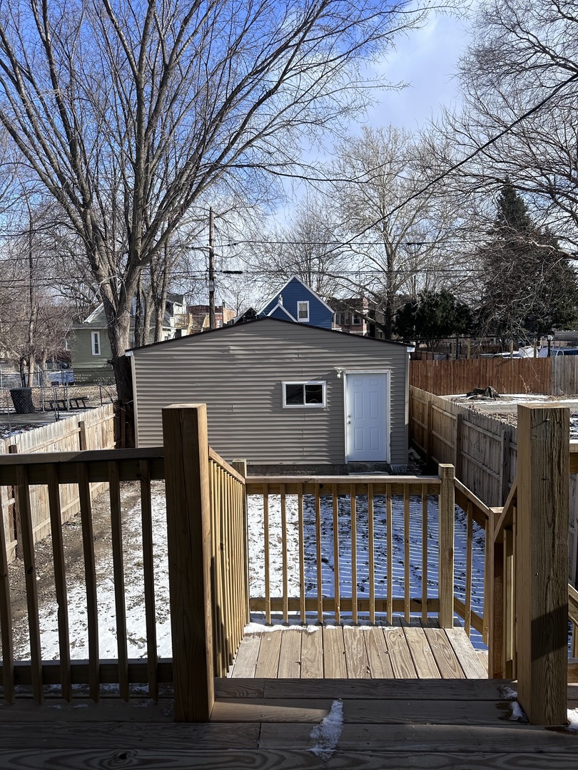 6715 South Sangamon Street Chicago, IL 60621 - Photo 35 of 43 a front view of a house with yard