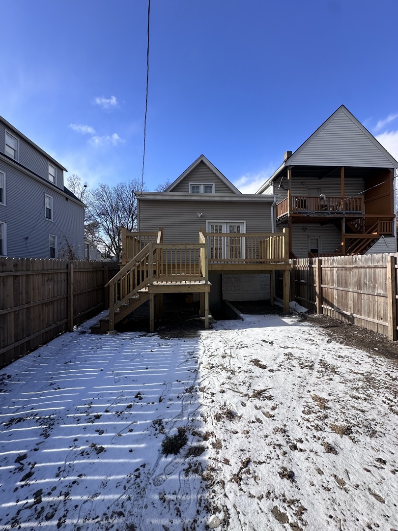 6715 South Sangamon Street Chicago, IL 60621 - Photo 41 of 43 a front view of a house with a yard