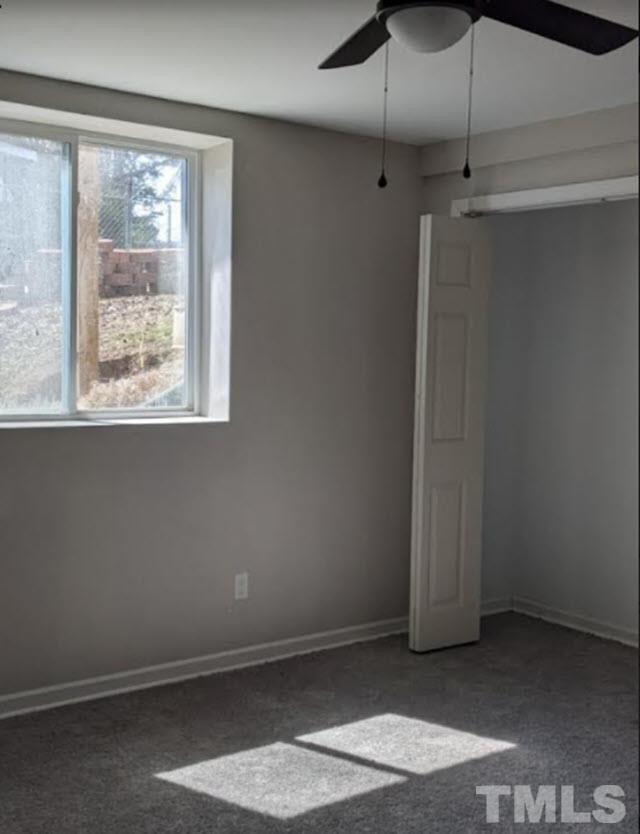 1610 Robinhood Road Durham, NC 27701 - Photo 4 of 7 an empty room with a window