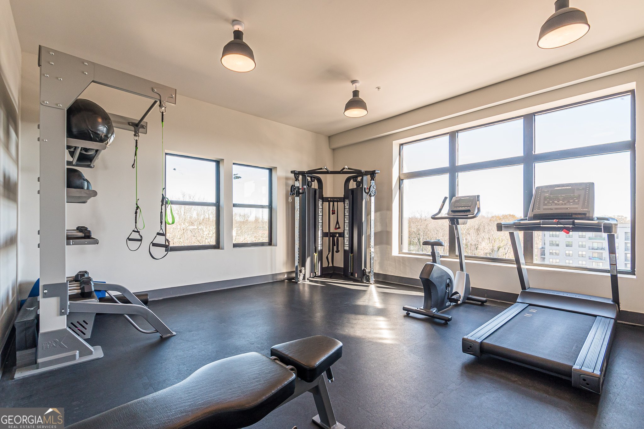 112 Rogers Street Northeast, Unit 601 Atlanta, GA 30317 - Photo 27 of 31 a view of a room with gym equipment