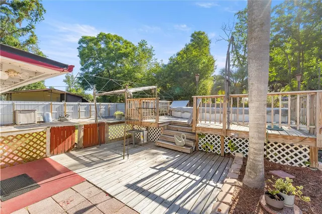 a view of a swimming pool with a patio