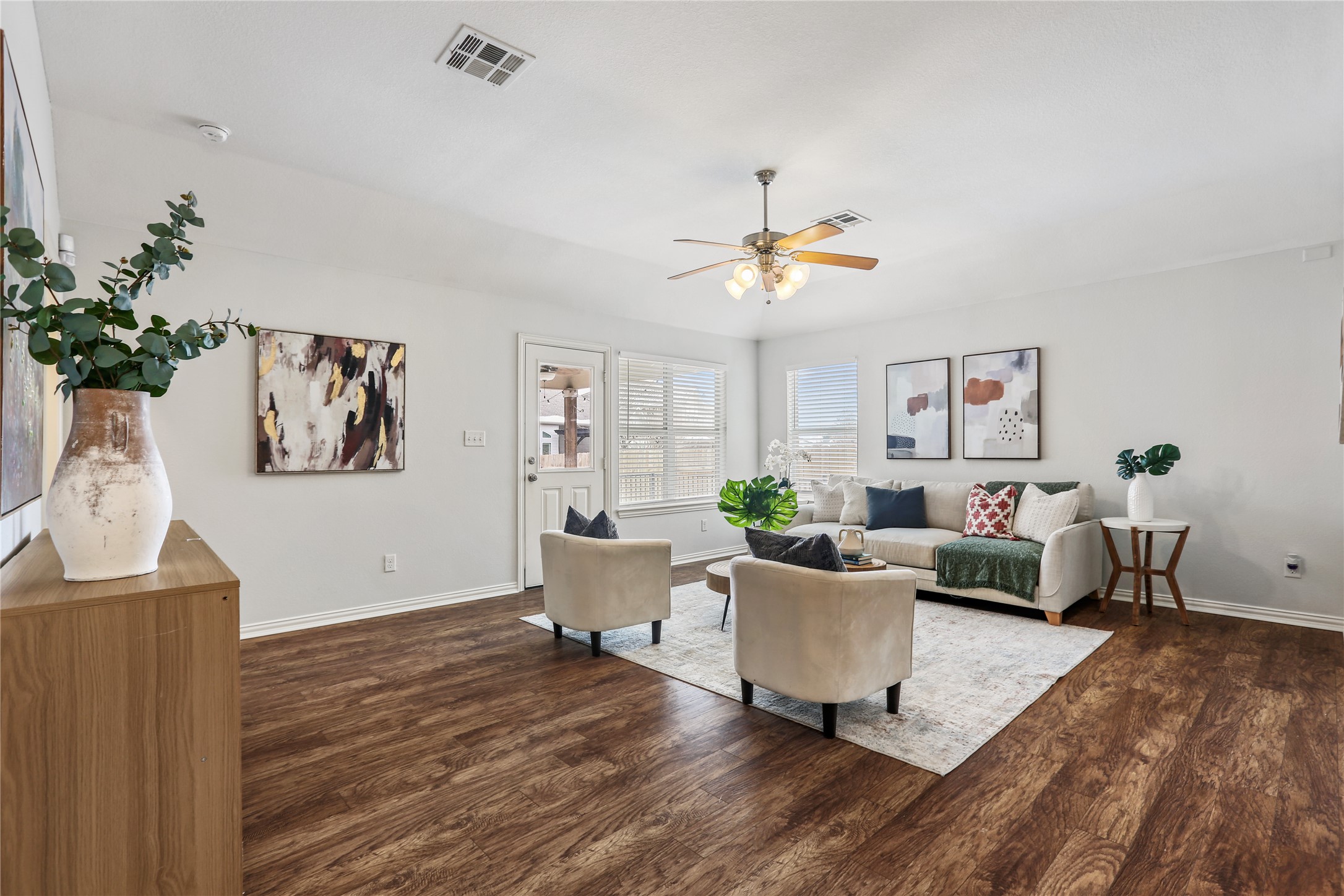 3900 Brean Down Road Pflugerville, TX 78660 - Photo 11 of 35 a living room with furniture and wooden floor