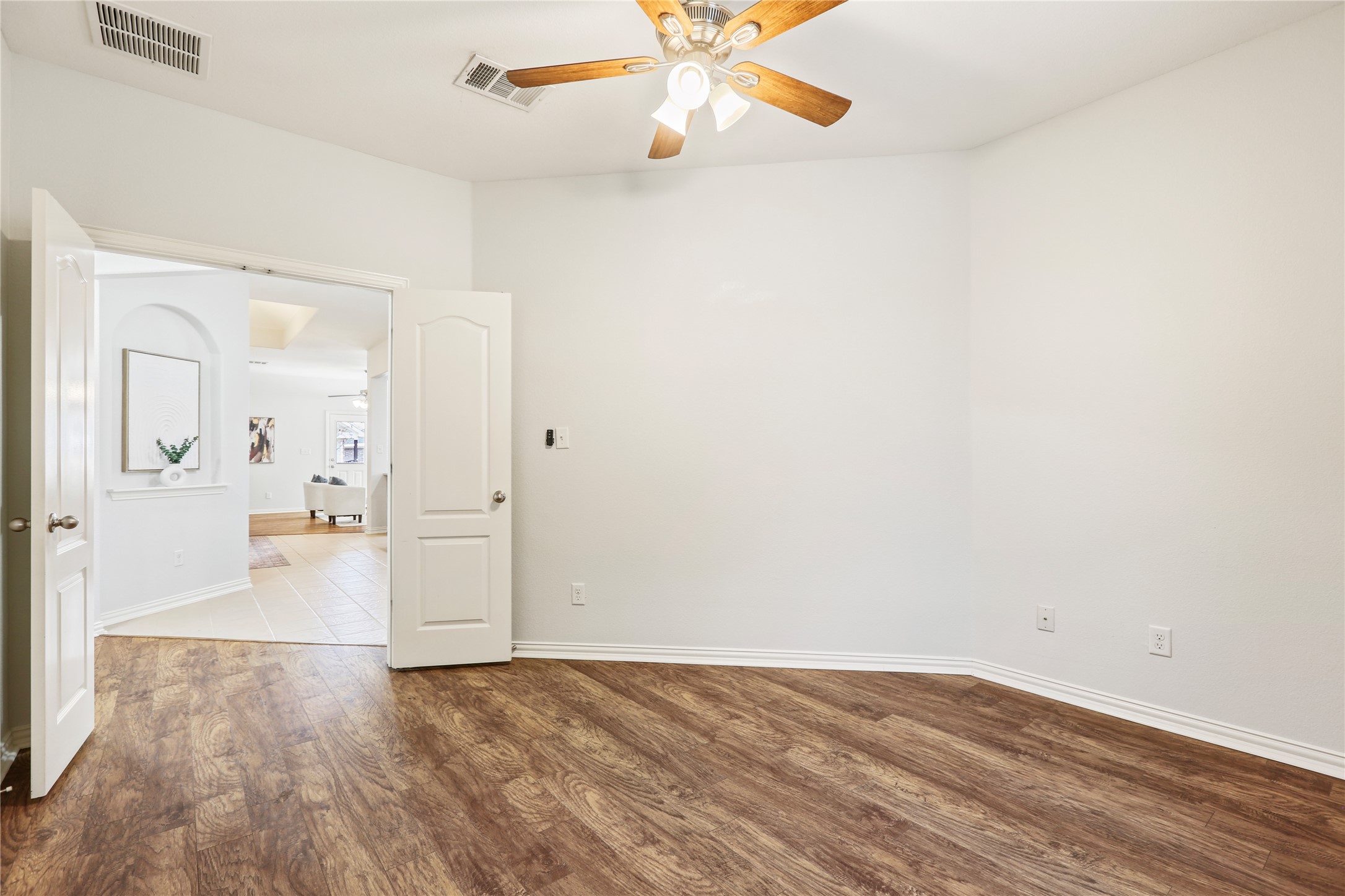 3900 Brean Down Road Pflugerville, TX 78660 - Photo 13 of 35 wooden floor in an empty room
