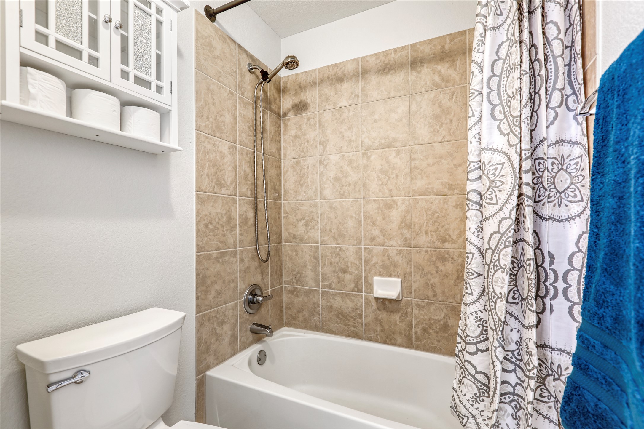 3900 Brean Down Road Pflugerville, TX 78660 - Photo 16 of 35 a bathroom with a bathtub and shower