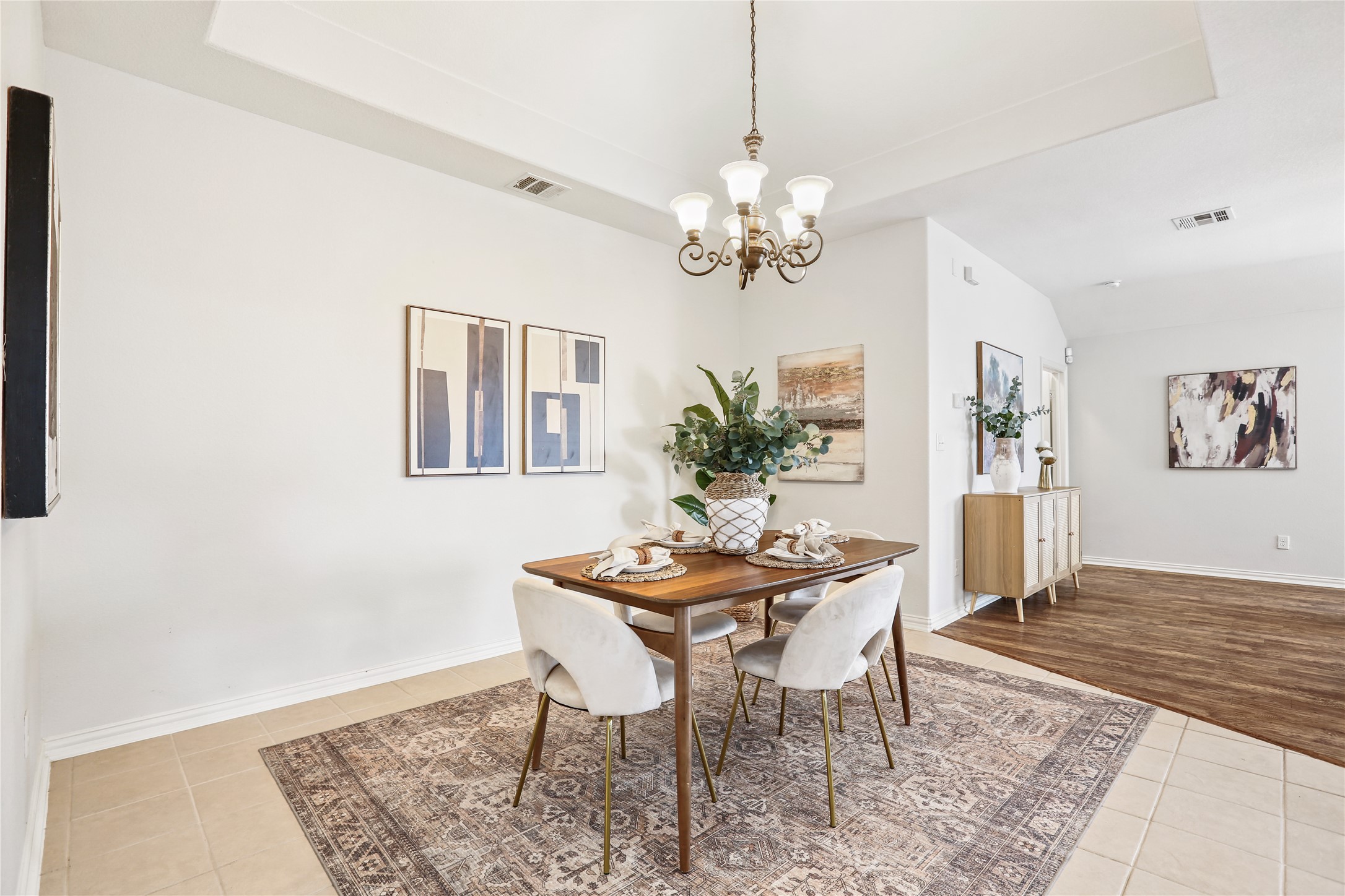 3900 Brean Down Road Pflugerville, TX 78660 - Photo 8 of 35 a view of a dining room with furniture and chandelier