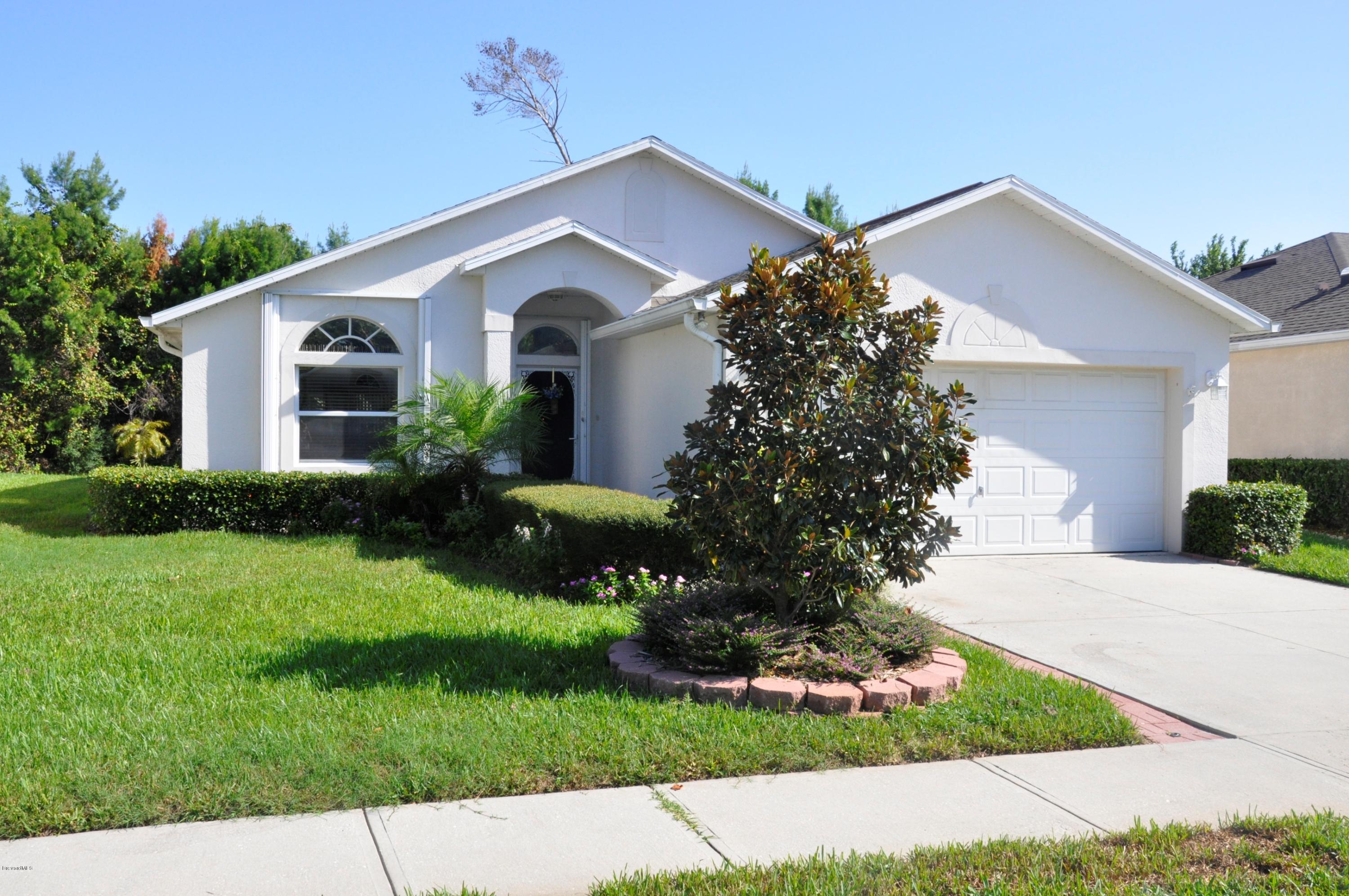 2135 Spring Creek Circle Palm Bay, FL 32905 - Photo 1 of 15 Front View