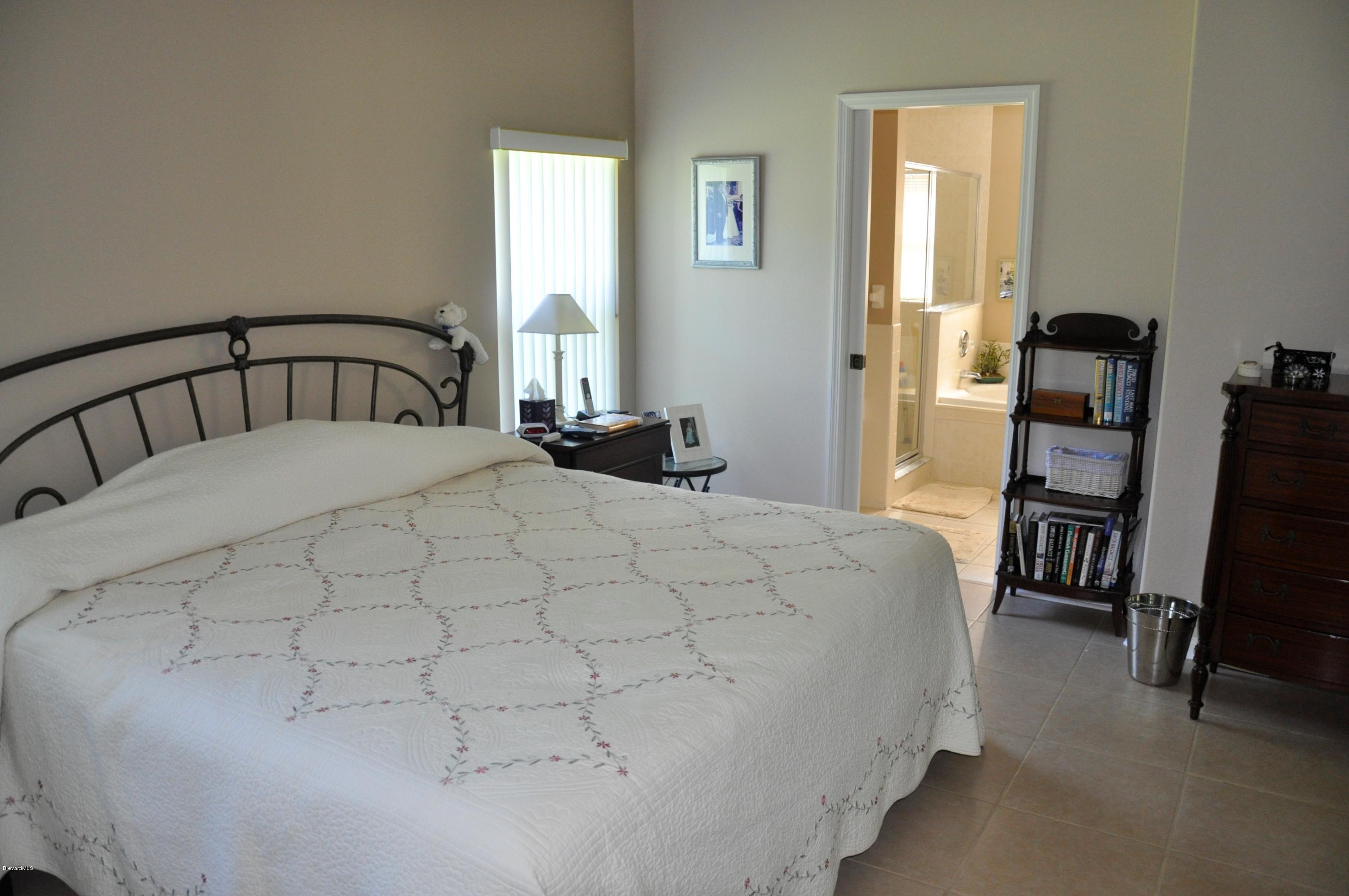 2135 Spring Creek Circle Palm Bay, FL 32905 - Photo 6 of 15 Master Bedroom