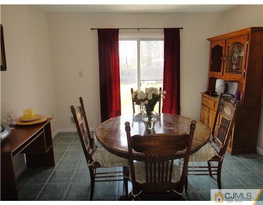 4 Ashley Road Edison, NJ 08817 - Photo 4 of 10 a view of a dining room with furniture and window