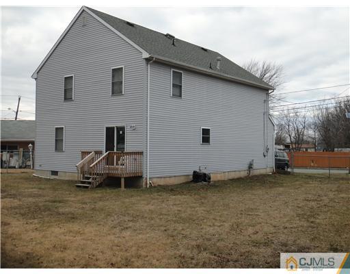 4 Ashley Road Edison, NJ 08817 - Photo 7 of 10 a view of a house with a patio