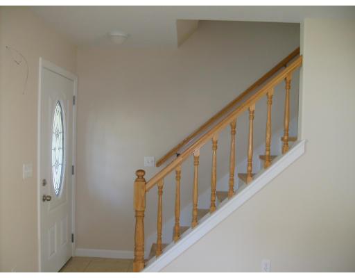 136 Benz Street Springfield, MA 01118 - Photo 5 of 9 a view of staircase with lots of windows