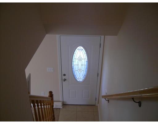 136 Benz Street Springfield, MA 01118 - Photo 8 of 9 a view of entryway with wooden floor