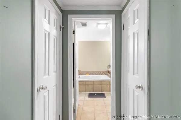a view of a bathroom with a glass door