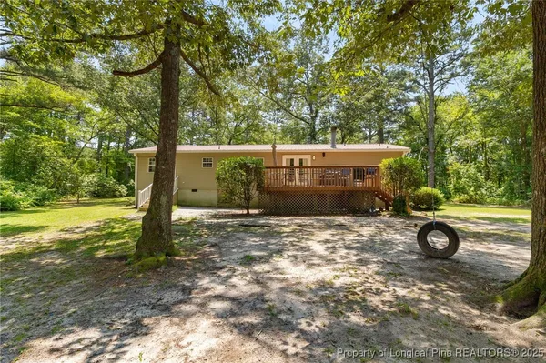 a view of a outdoor space with deck