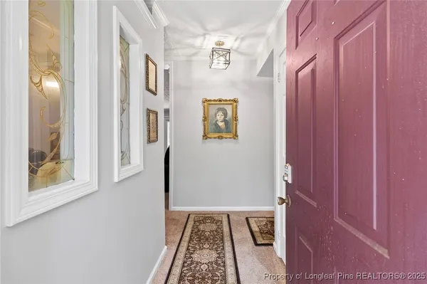 a view of an entryway with furniture