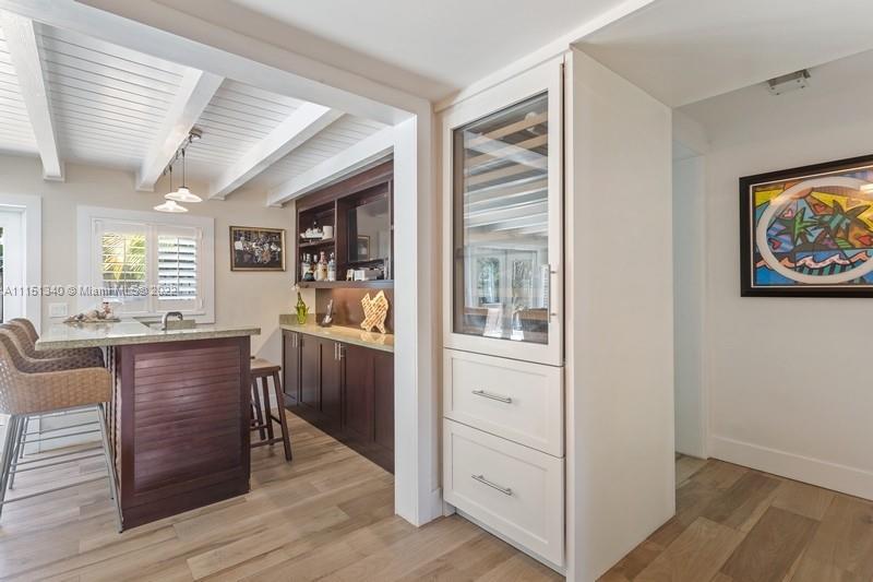 710 Woodcrest Road Key Biscayne, FL 33149 - Photo 11 of 34 a kitchen with a refrigerator and a stove