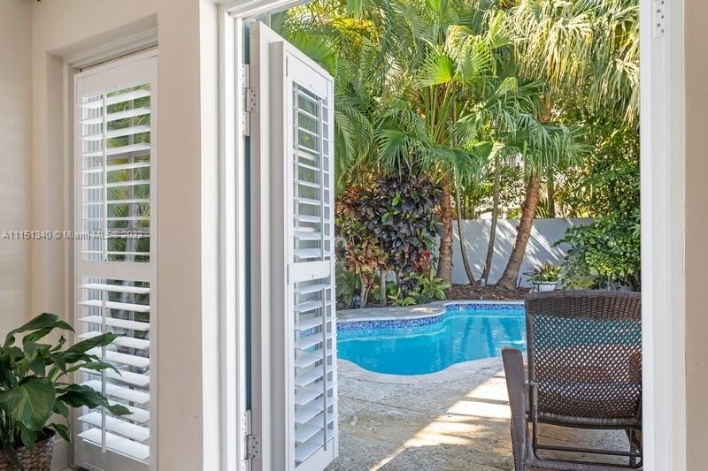 710 Woodcrest Road Key Biscayne, FL 33149 - Photo 14 of 34 a view of balcony with furniture
