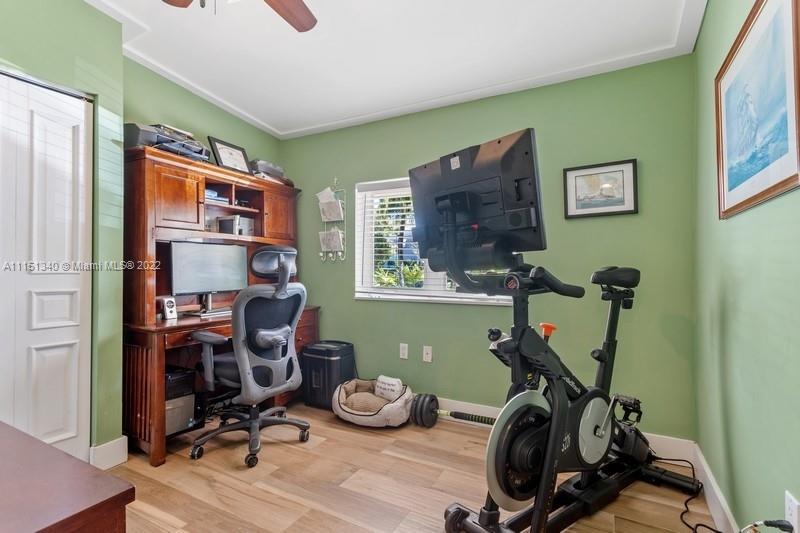 710 Woodcrest Road Key Biscayne, FL 33149 - Photo 22 of 34 a view of a room with gym equipment