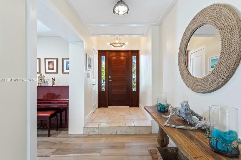 710 Woodcrest Road Key Biscayne, FL 33149 - Photo 5 of 34 a living room with furniture and a wooden floor