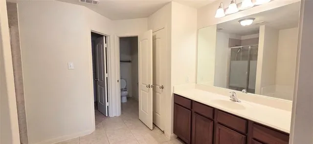 a bathroom with a sink and toilet
