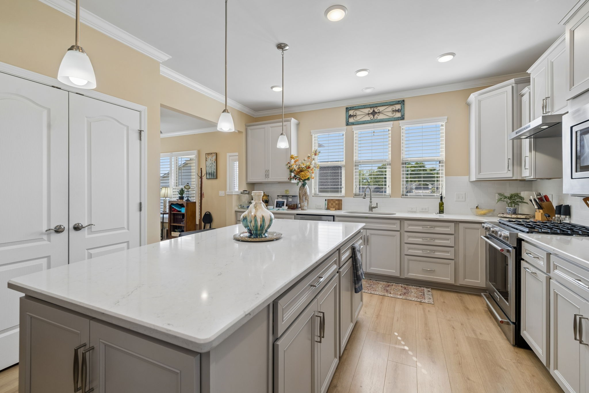 1600 Grainger Springs Spring Hill, TN 37174 - Photo 13 of 26 a kitchen with a sink stove and cabinets