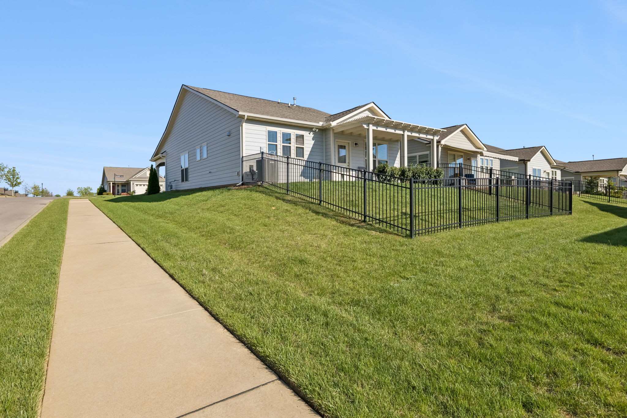 1600 Grainger Springs Spring Hill, TN 37174 - Photo 21 of 26 a view of a house with a big yard and large trees