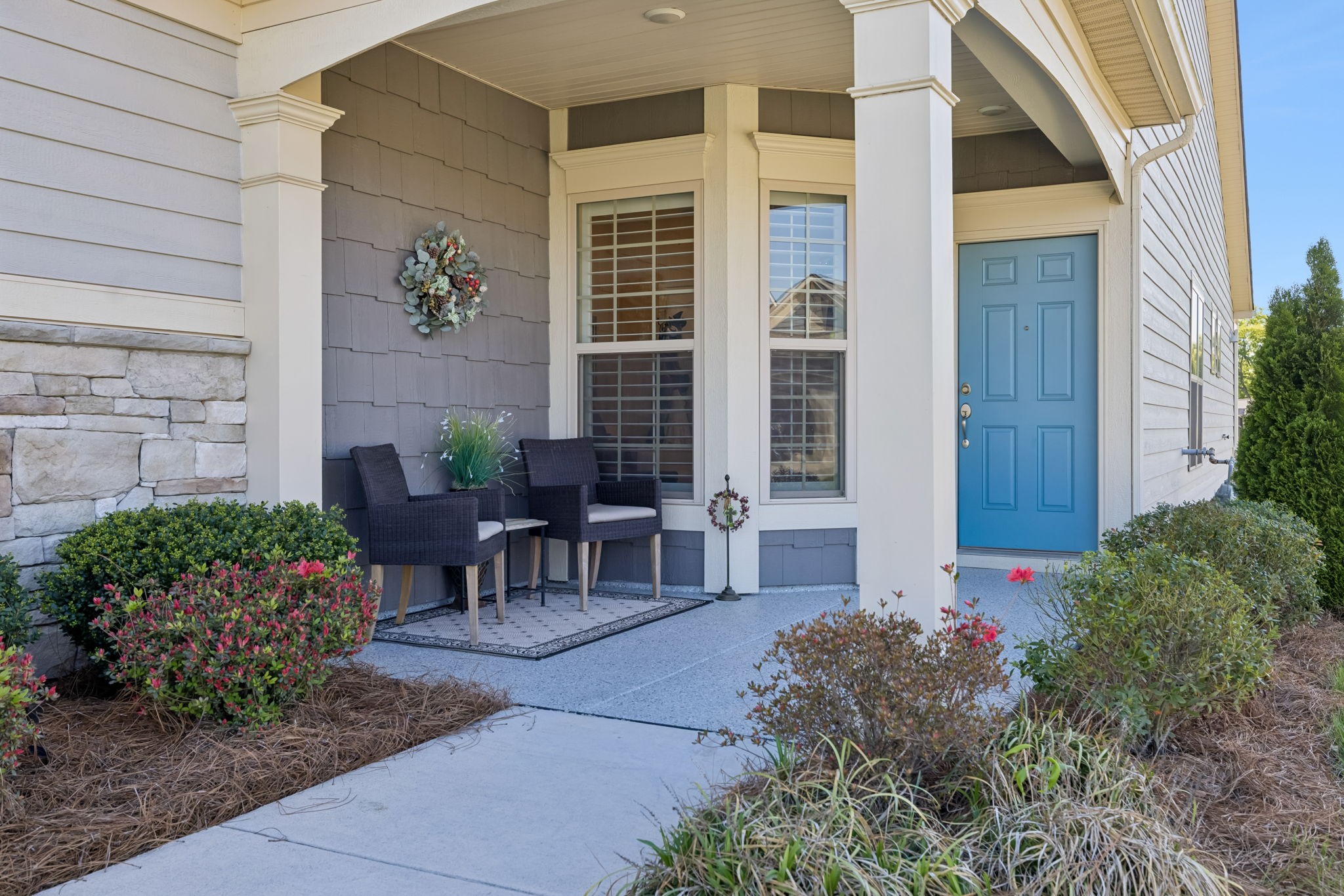 1600 Grainger Springs Spring Hill, TN 37174 - Photo 3 of 26 a view of a patio with table and chairs and potted plants