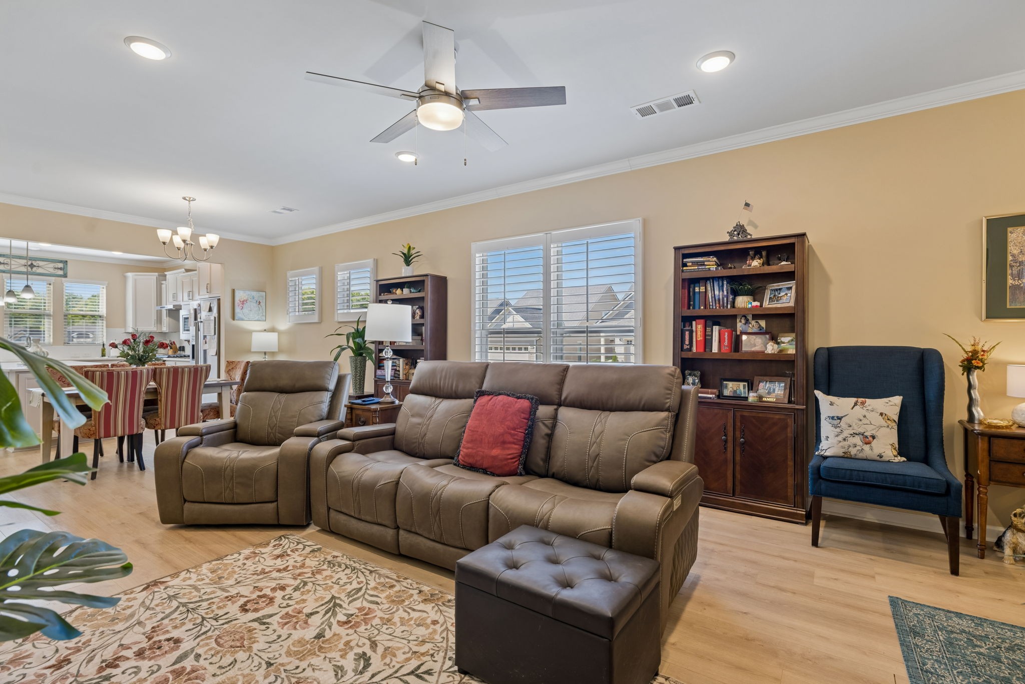 1600 Grainger Springs Spring Hill, TN 37174 - Photo 5 of 26 a living room with furniture a rug and a chandelier