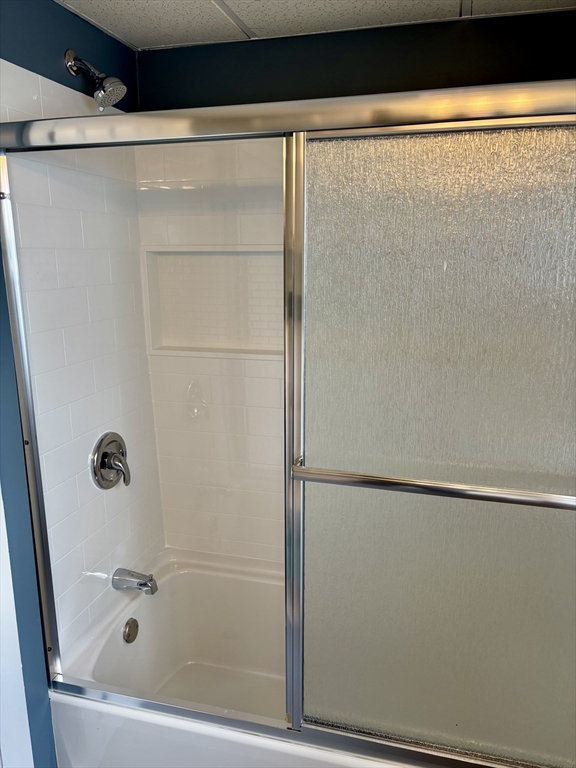 41 Baker Street, Unit 41 Malden, MA 02148 - Photo 11 of 11 a bathroom with a glass shower door