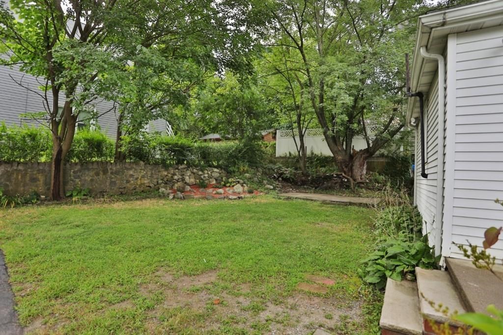 41 Baker Street, Unit 41 Malden, MA 02148 - Photo 4 of 11 a view of backyard with green space