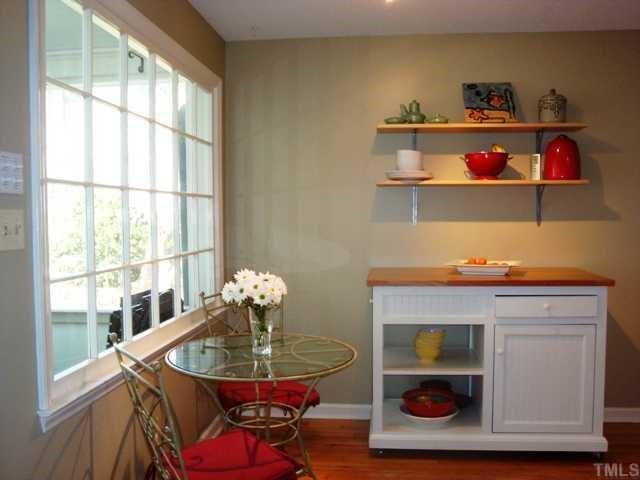 5912 Rondan Circle Raleigh, NC 27612 - Photo 6 of 12 a dining room with furniture and wooden floor