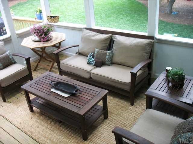 5912 Rondan Circle Raleigh, NC 27612 - Photo 10 of 12 a outdoor living room with furniture and a potted plant