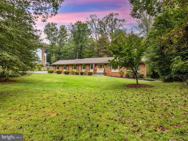 a house with garden in front of it