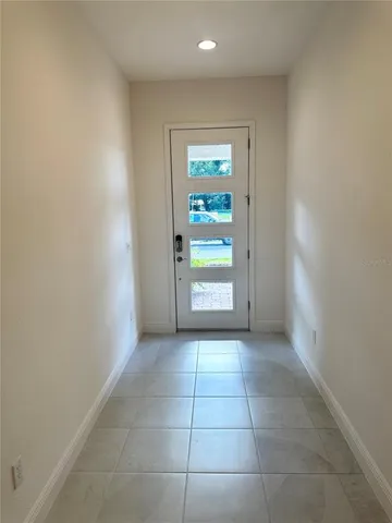 a view of an empty room and window