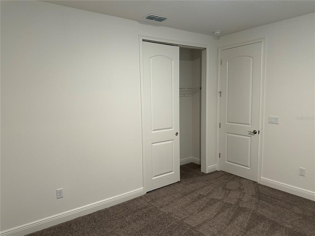 5282 Buttonsage Drive St. Cloud, FL 34772 - Photo 21 of 43 a view of an empty room