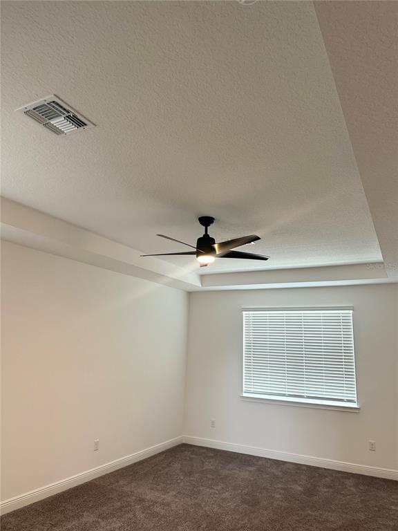 5282 Buttonsage Drive St. Cloud, FL 34772 - Photo 31 of 43 a view of an empty room with a window