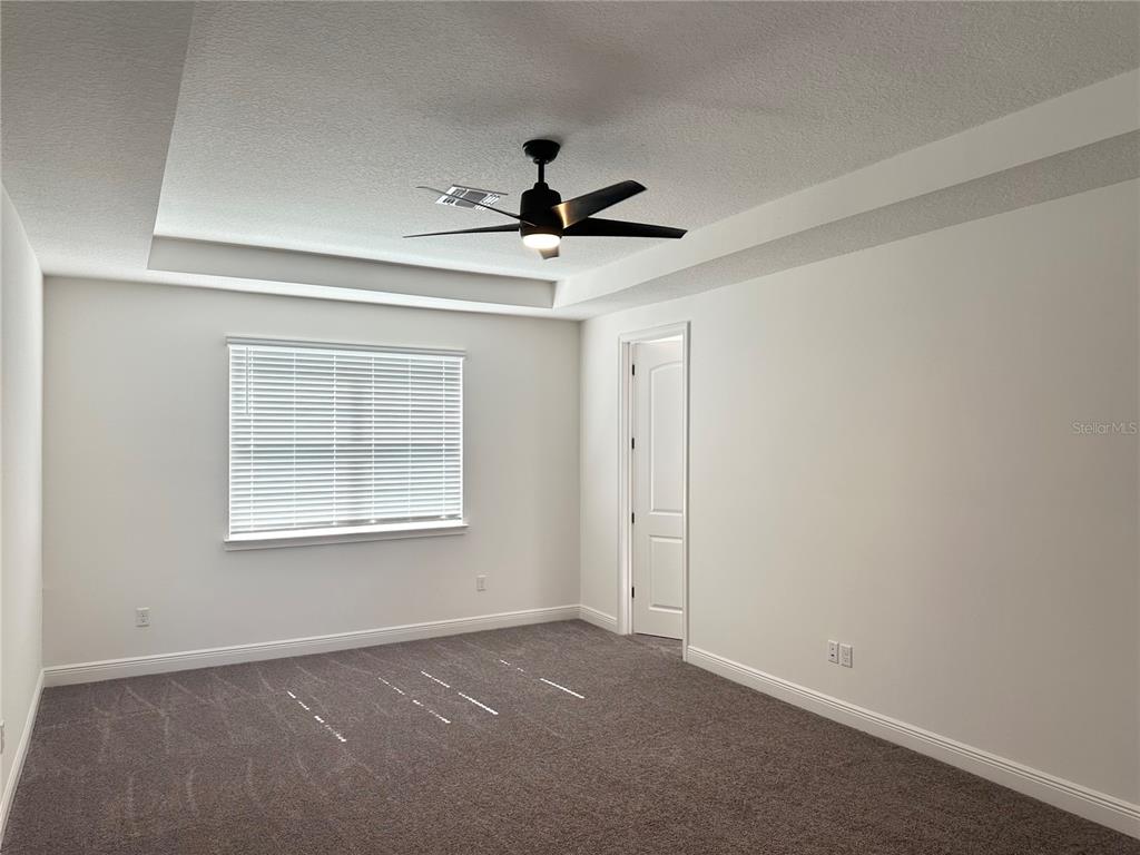 5282 Buttonsage Drive St. Cloud, FL 34772 - Photo 33 of 43 a view of an empty room with a window